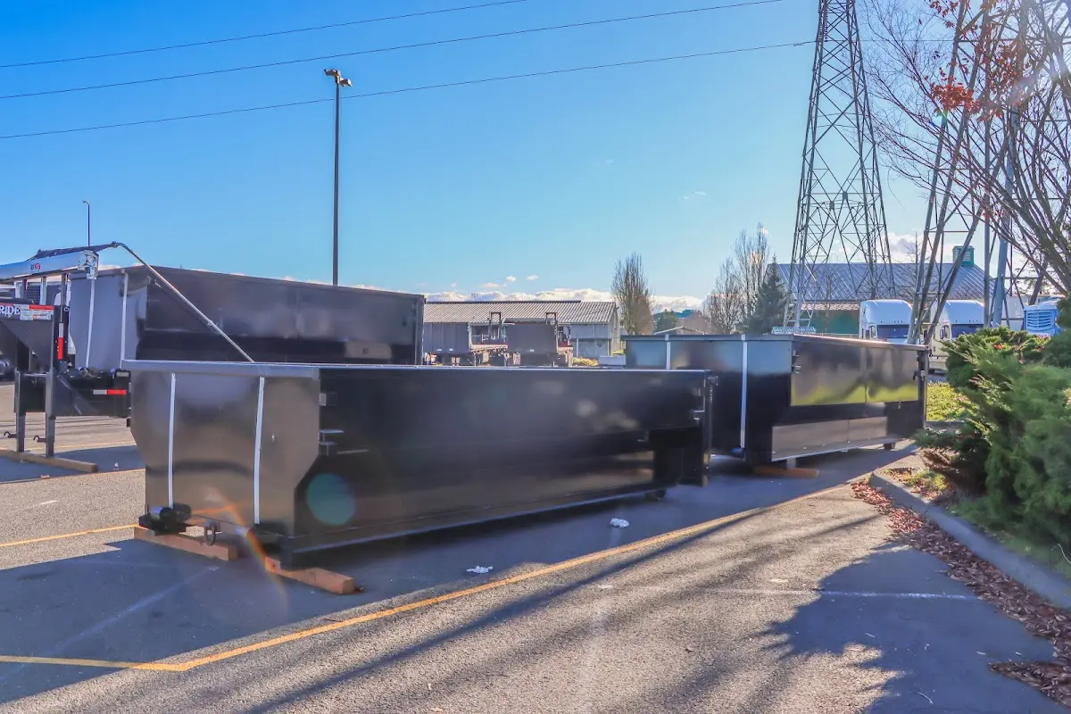 Roll-off dumpster ready for waste disposal at job site for Demolition Dumpster Rental in East Buffalo
